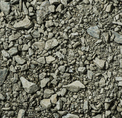 Grün-gräulicher Frostschutz-Schotter von nahem betrachtet.
